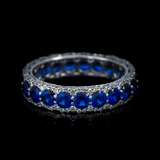 <span class="subtitlerp">Romancína Collection</span><br /><br />Blue Sapphire and Diamond Eternity Ring
