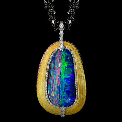 <span class="subtitlerp">Treasured Opals Collection</span><br /><br />2016 AGTA Award Winning 23.94ct Boulder Opal, Diamond & Sapphire Pendant