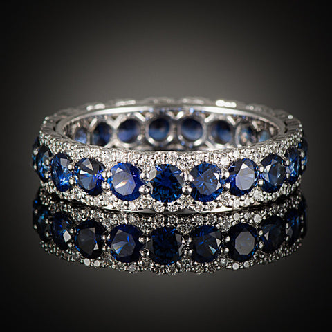 <span class="subtitlerp">Romancína Collection</span><br /><br />Blue Sapphire and Diamond Eternity Ring