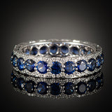 <span class="subtitlerp">Romancína Collection</span><br /><br />Blue Sapphire and Diamond Eternity Ring