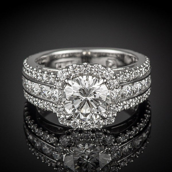 <span class="subtitlerp">Passion Collection</span><br /><br />Platinum Passion Diamond Halo Engagement Ring