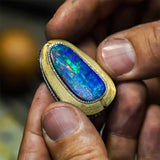 <span class="subtitlerp">Treasured Opals Collection</span><br /><br />2016 AGTA Award Winning 23.94ct Boulder Opal, Diamond & Sapphire Pendant